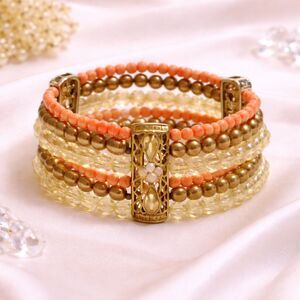 Multi Strand Coral and Gold Colored Beaded Rhinestone Station Stretch Bracelet